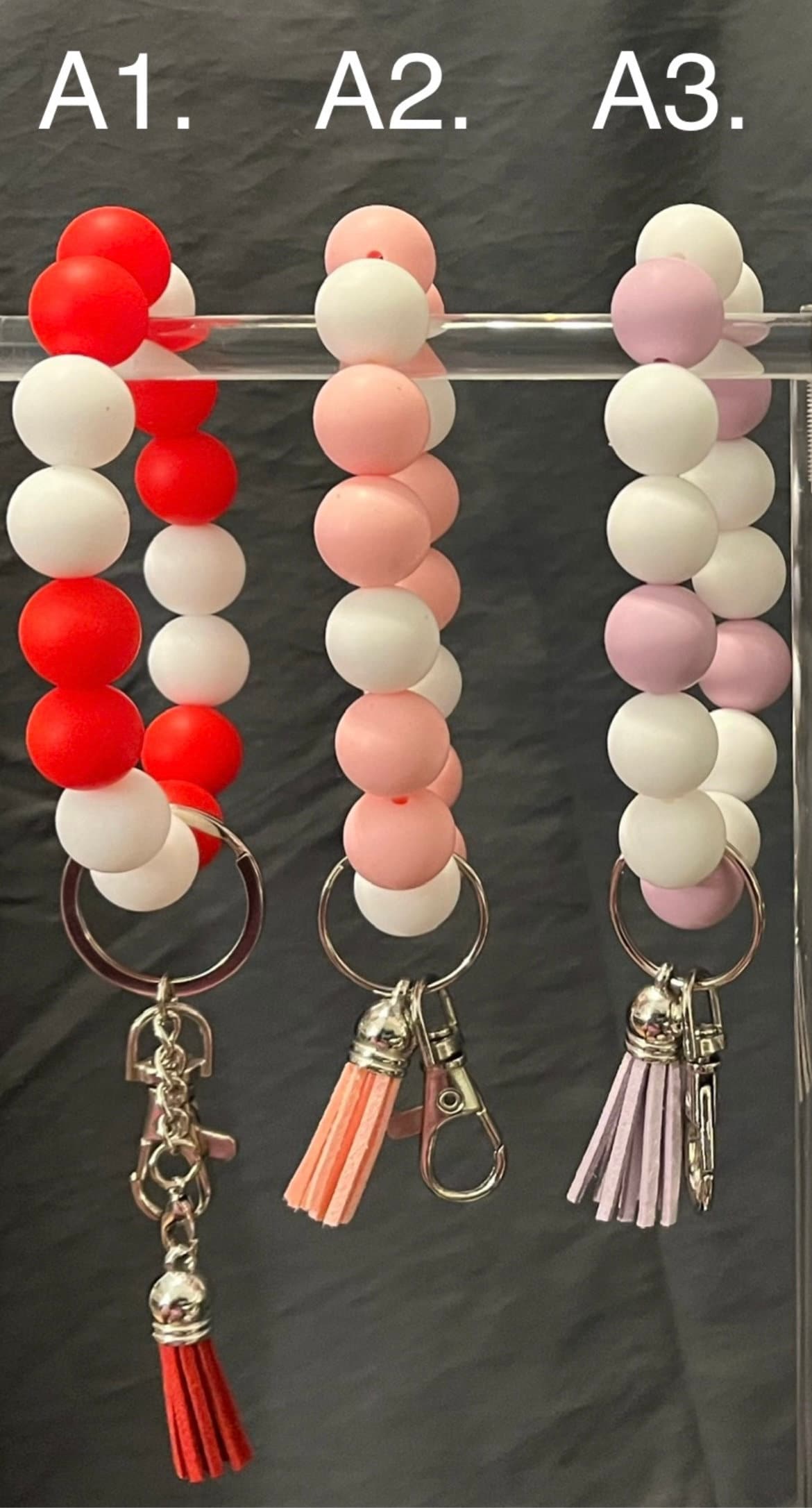 Elegance at Your Fingertips: Stylish Silicon Wristlet Keychain for On-the-Go Convenience!